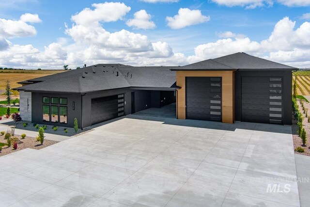 view of front of property with a garage