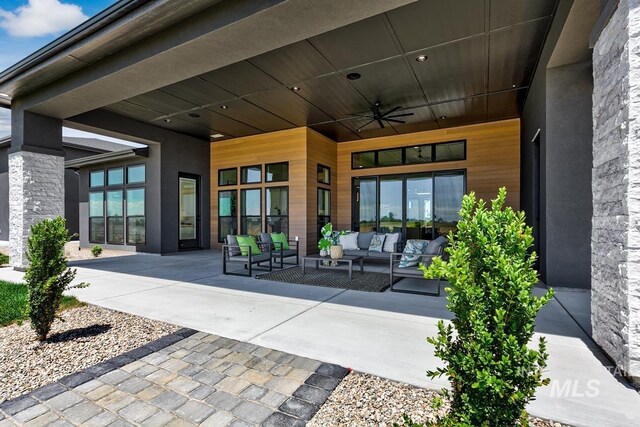 view of patio / terrace with outdoor lounge area and ceiling fan