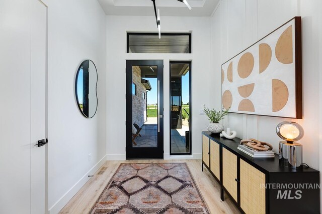 entrance foyer with light hardwood / wood-style floors