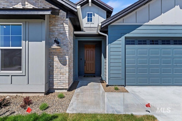 property entrance with a garage