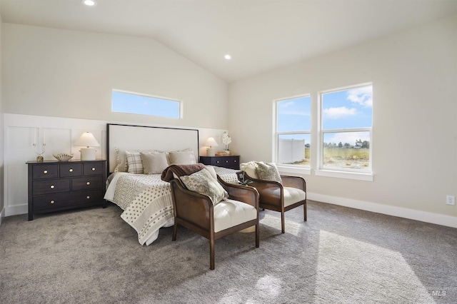 bedroom featuring carpet and lofted ceiling