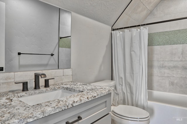 full bath featuring vanity, lofted ceiling, shower / bath combination with curtain, toilet, and tasteful backsplash