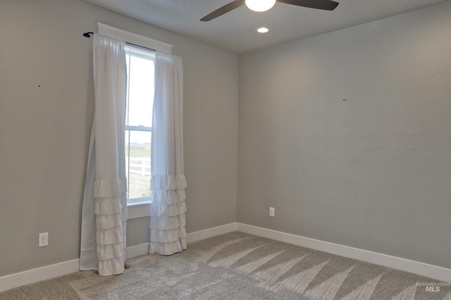 empty room with recessed lighting, carpet, baseboards, and ceiling fan