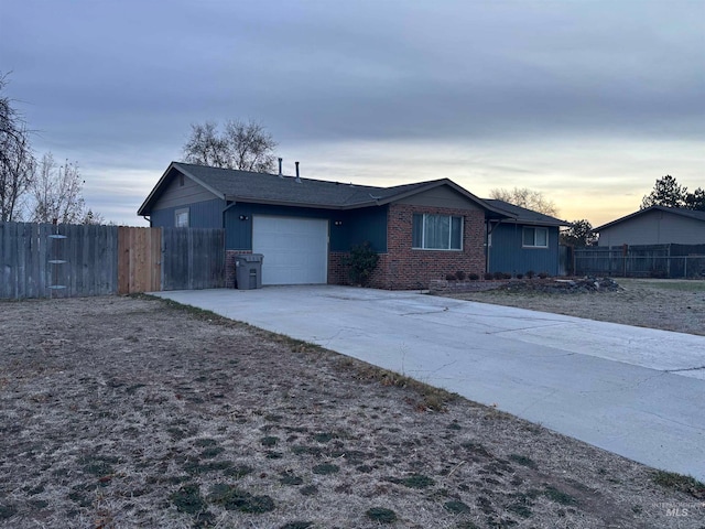 single story home featuring a garage