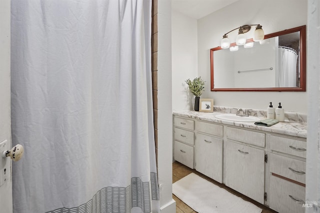 full bathroom featuring vanity
