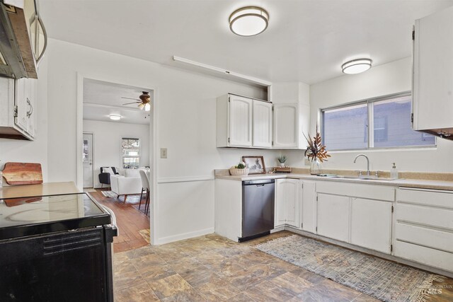 kitchen with dishwasher, white cabinets, a sink, and light countertops
