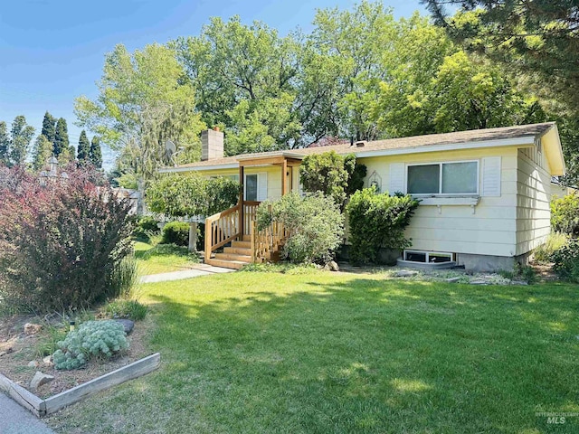 2901 Almo Ave, Burley, ID 83318 - view of front facade featuring a front yard and a chimney