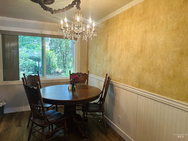 2901 Almo Ave, Burley, ID 83318 - dining space featuring a chandelier, crown molding, wood finished floors, and wainscoting