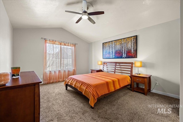 carpeted bedroom featuring a textured ceiling, baseboards, lofted ceiling, and a ceiling fan