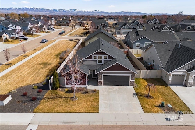 aerial view with a mountain view and a residential view