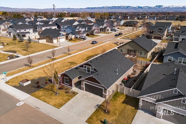 aerial view with a residential view and a mountain view