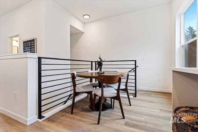 2031 S Makar Ln, Boise, ID 83706 - dining room featuring baseboards and light wood-type flooring