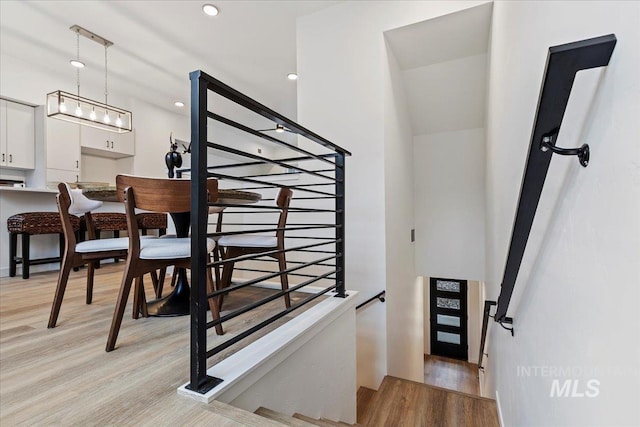 2031 S Makar Ln, Boise, ID 83706 - stairway featuring wood finished floors and recessed lighting