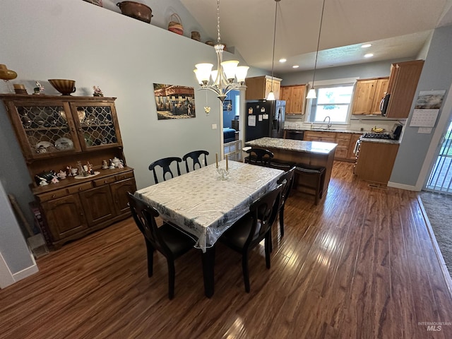 805 W Arbor Pointe Way, Nampa, ID 83686 - dining space with dark wood-type flooring, a chandelier, recessed lighting, lofted ceiling, and baseboards