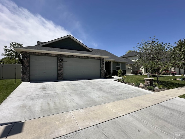 805 W Arbor Pointe Way, Nampa, ID 83686 - ranch-style home featuring a garage, driveway, and stone siding