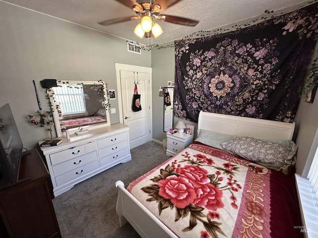 805 W Arbor Pointe Way, Nampa, ID 83686 - bedroom featuring dark carpet, a ceiling fan, a textured ceiling, and baseboards