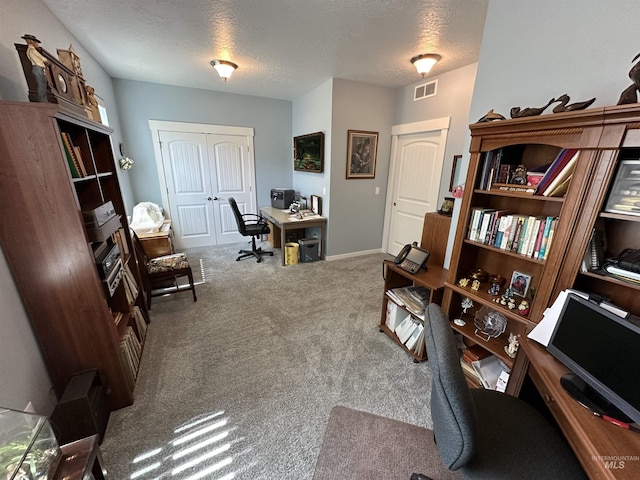 805 W Arbor Pointe Way, Nampa, ID 83686 - home office with a textured ceiling, carpet floors, and baseboards