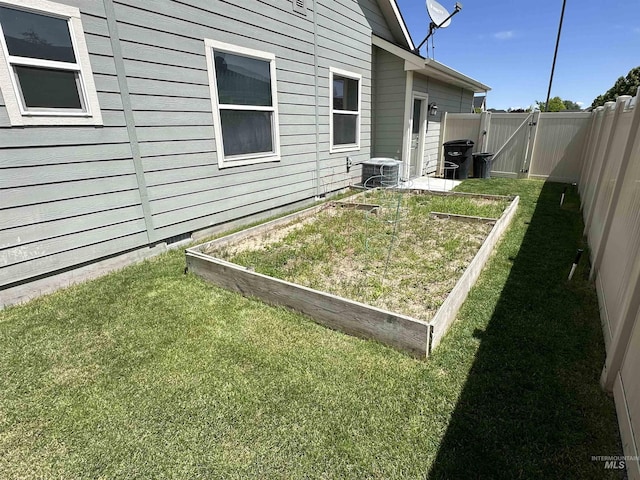 805 W Arbor Pointe Way, Nampa, ID 83686 - view of yard with a vegetable garden and central air condition unit