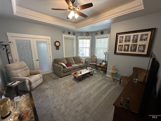 805 W Arbor Pointe Way, Nampa, ID 83686 - carpeted living area featuring a raised ceiling, ceiling fan, french doors, and baseboards