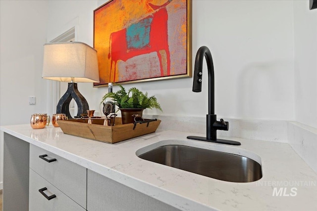 2007 S Makar Ln, Boise, ID 83706 - detailed view of a sink and light stone counters