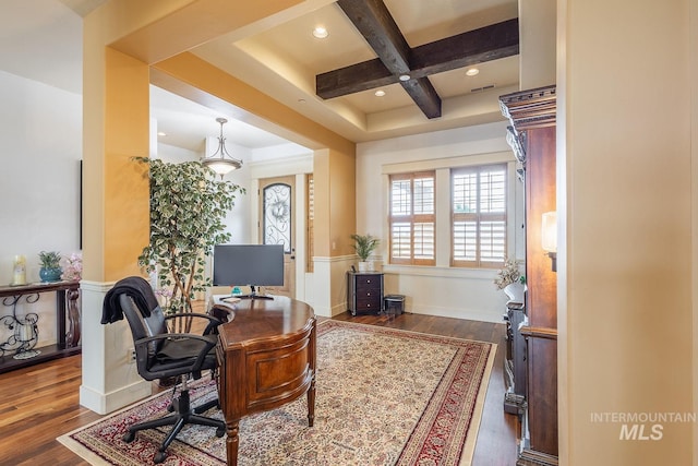 home office with beam ceiling, wood finished floors, visible vents, and coffered ceiling