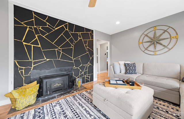 2906 W Kathryn St, Boise, ID 83705 - living room featuring wood finished floors, baseboards, a tile fireplace, and recessed lighting