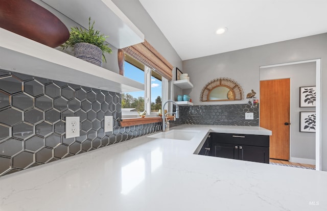 2906 W Kathryn St, Boise, ID 83705 - kitchen featuring a sink, decorative backsplash, open shelves, light stone counters, and recessed lighting
