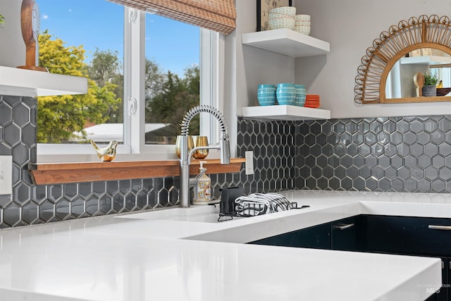 2906 W Kathryn St, Boise, ID 83705 - kitchen view of open shelves, backsplash, light countertops, and a sink
