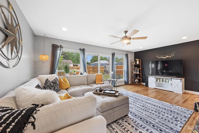 2906 W Kathryn St, Boise, ID 83705 - living area with wood finished floors, ceiling fan, recessed lighting, and baseboards