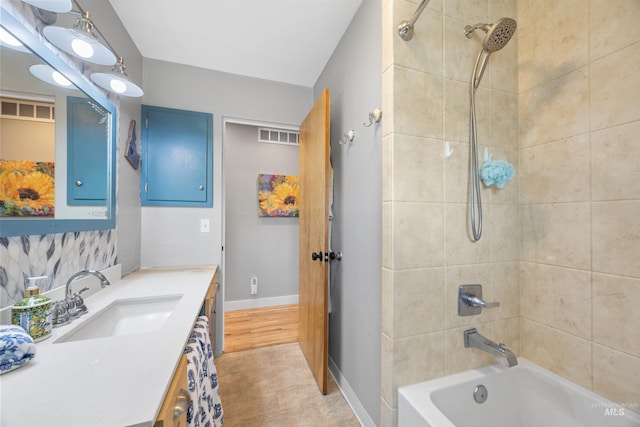 2906 W Kathryn St, Boise, ID 83705 - full bathroom featuring shower / washtub combination, vanity, and baseboards