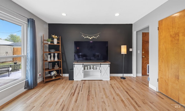 2906 W Kathryn St, Boise, ID 83705 - living room with wood finished floors, baseboards, and recessed lighting