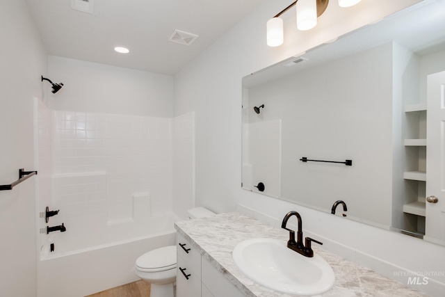 full bathroom featuring vanity, toilet, and shower / bath combination