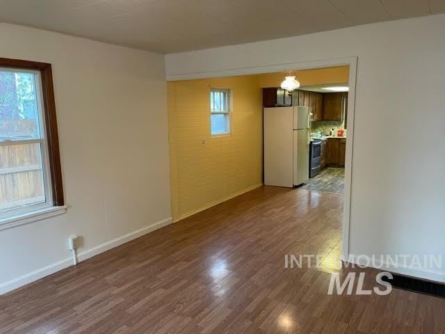 271 Tyler St, Twin Falls, ID 83301 - empty room featuring dark wood finished floors and plenty of natural light