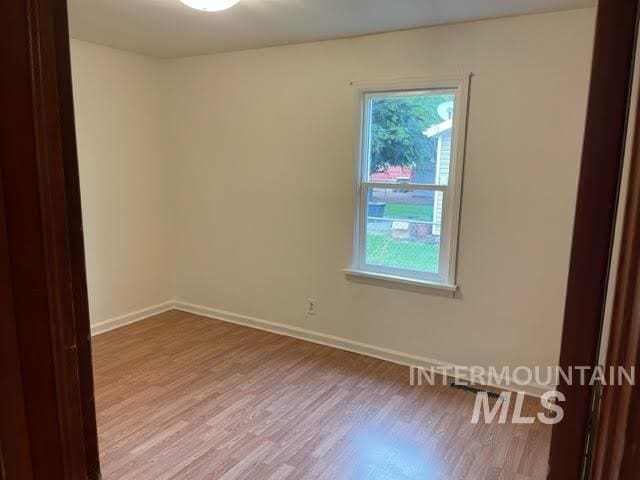 271 Tyler St, Twin Falls, ID 83301 - empty room with light wood-style flooring
