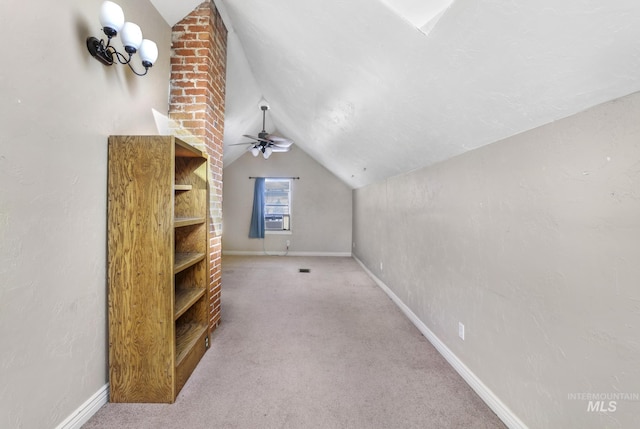 bonus room featuring lofted ceiling, carpet floors, cooling unit, and baseboards