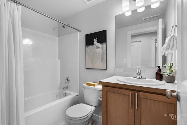 full bathroom with vanity, tasteful backsplash, toilet, and shower / tub combo with curtain