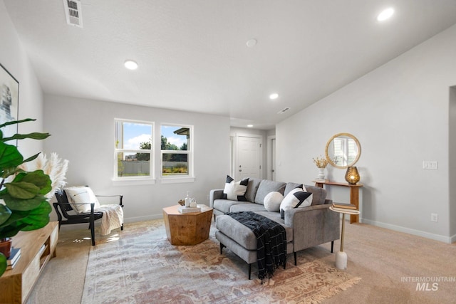 living room featuring light colored carpet