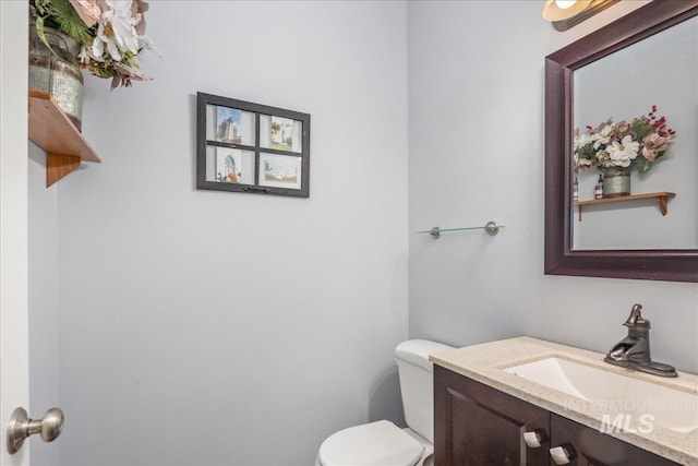 6495 S Mistyglen Ave, Boise, ID 83709 - bathroom with toilet and vanity