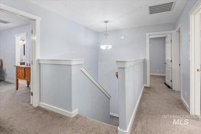 6495 S Mistyglen Ave, Boise, ID 83709 - corridor featuring an upstairs landing, carpet flooring, and baseboards