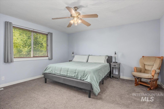 6495 S Mistyglen Ave, Boise, ID 83709 - carpeted bedroom with baseboards and a ceiling fan