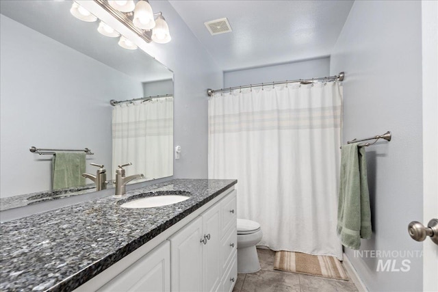 6495 S Mistyglen Ave, Boise, ID 83709 - full bathroom featuring vanity, toilet, tile patterned flooring, and a shower with shower curtain