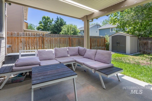 6495 S Mistyglen Ave, Boise, ID 83709 - fenced backyard with outdoor lounge area and a patio