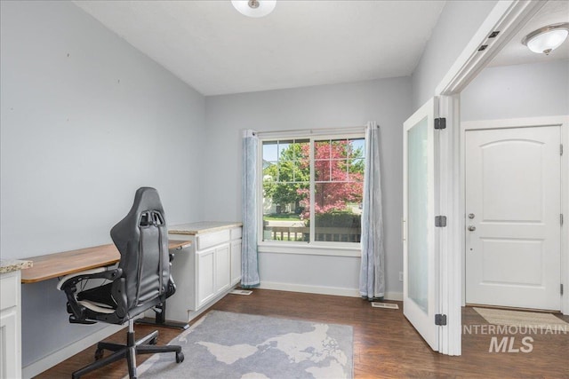 6495 S Mistyglen Ave, Boise, ID 83709 - office space with dark wood-style flooring and baseboards