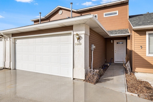 single story home with a garage