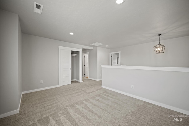 10061 W La Jolla Dr, Boise, ID 83709 - carpeted empty room featuring recessed lighting and a chandelier