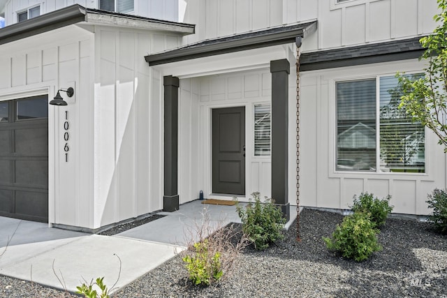 10061 W La Jolla Dr, Boise, ID 83709 - entrance to property featuring board and batten siding and a garage