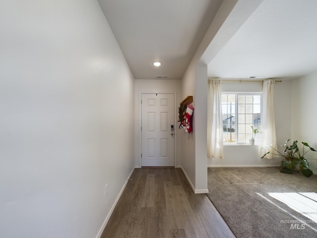 doorway to outside with hardwood / wood-style floors