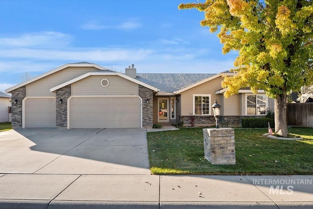 single story home featuring a garage and a front lawn