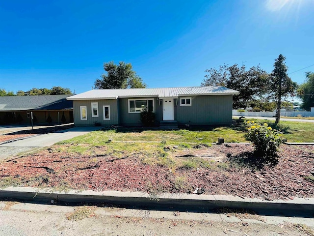 ranch-style house with a carport