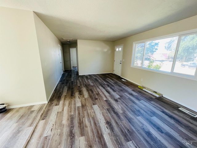 interior space with dark wood-type flooring